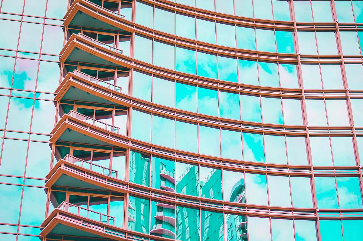 office building blue and white glass walled building charlotte